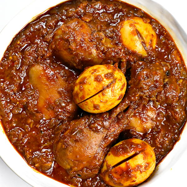 Full Doro Wot Tray Full Doro Wot – Richly spiced chicken stew with 12 pieces of chicken and 12 eggs.